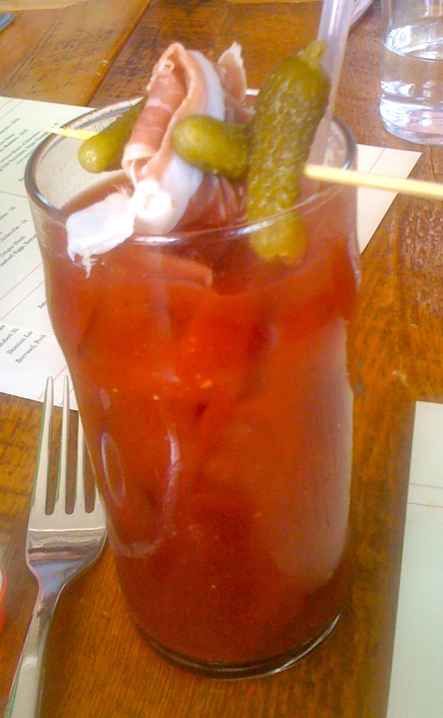 Made with red wine and garnished with cornichons and prosciutto, the bloody mary's perfectly seasoned. (credit: CBS)