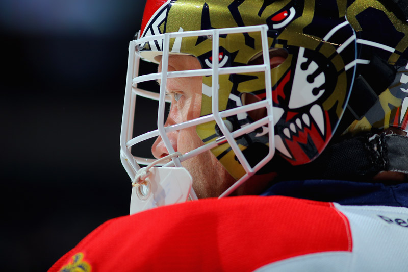 DENVER, CO - NOVEMBER 16:  Goalie Tim Thomas #34 of the Florida Panthers looks on during a break in the action against the Colorado Avalanche at Pepsi Center on November 16, 2013 in Denver, Colorado. The Panthers defeated the Avalanche 4-1.  