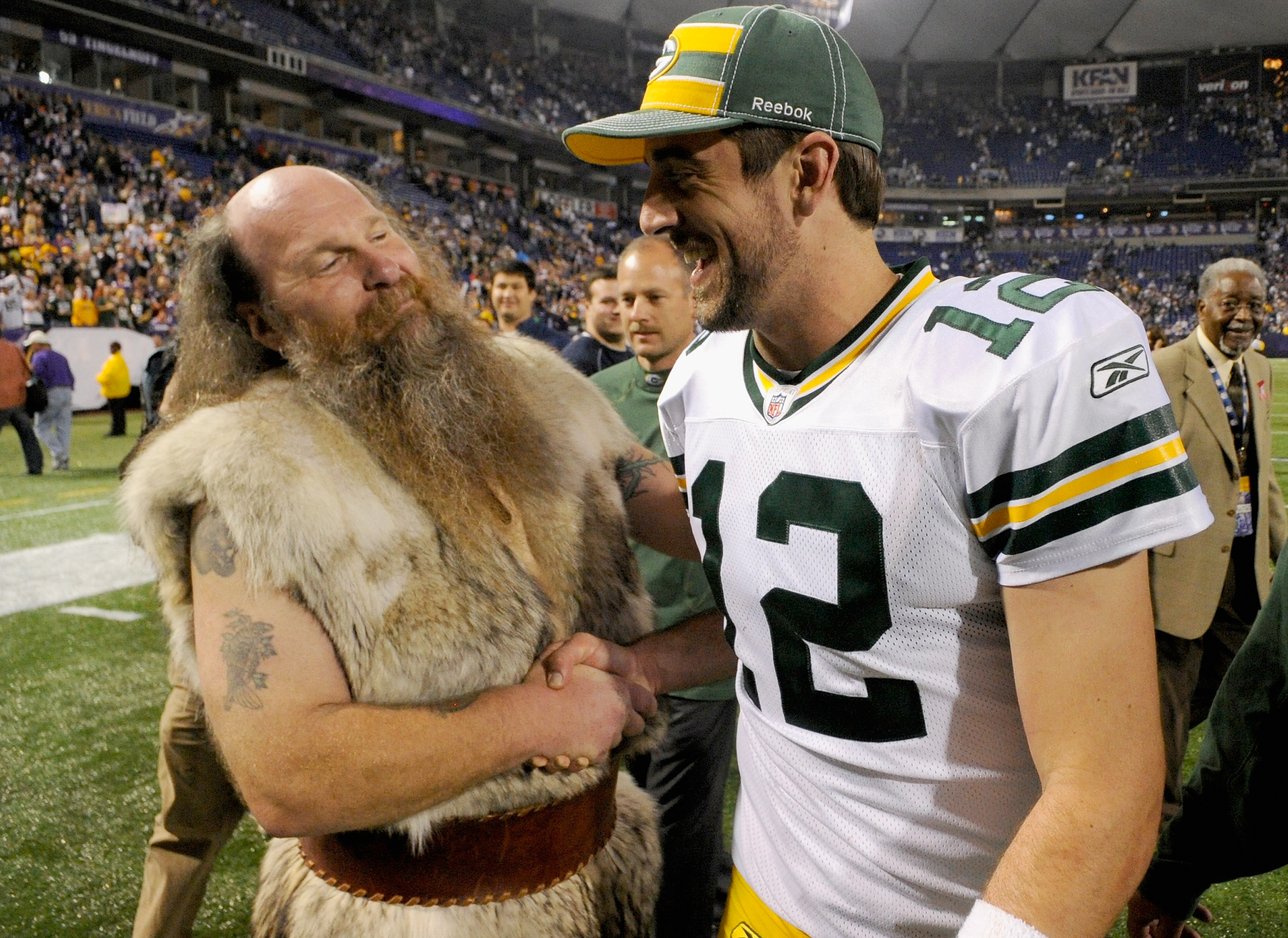Former Vikings Mascot Dons Cheesehead Before Border Battle.