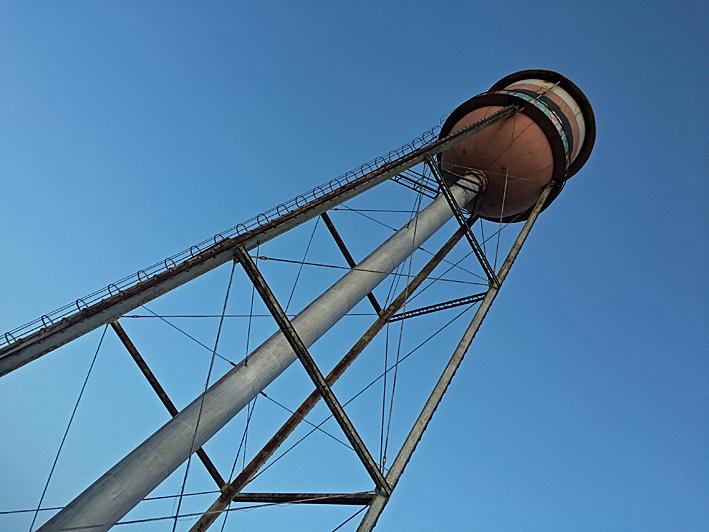 View of water tower directly outside brewery (credit: CBS)