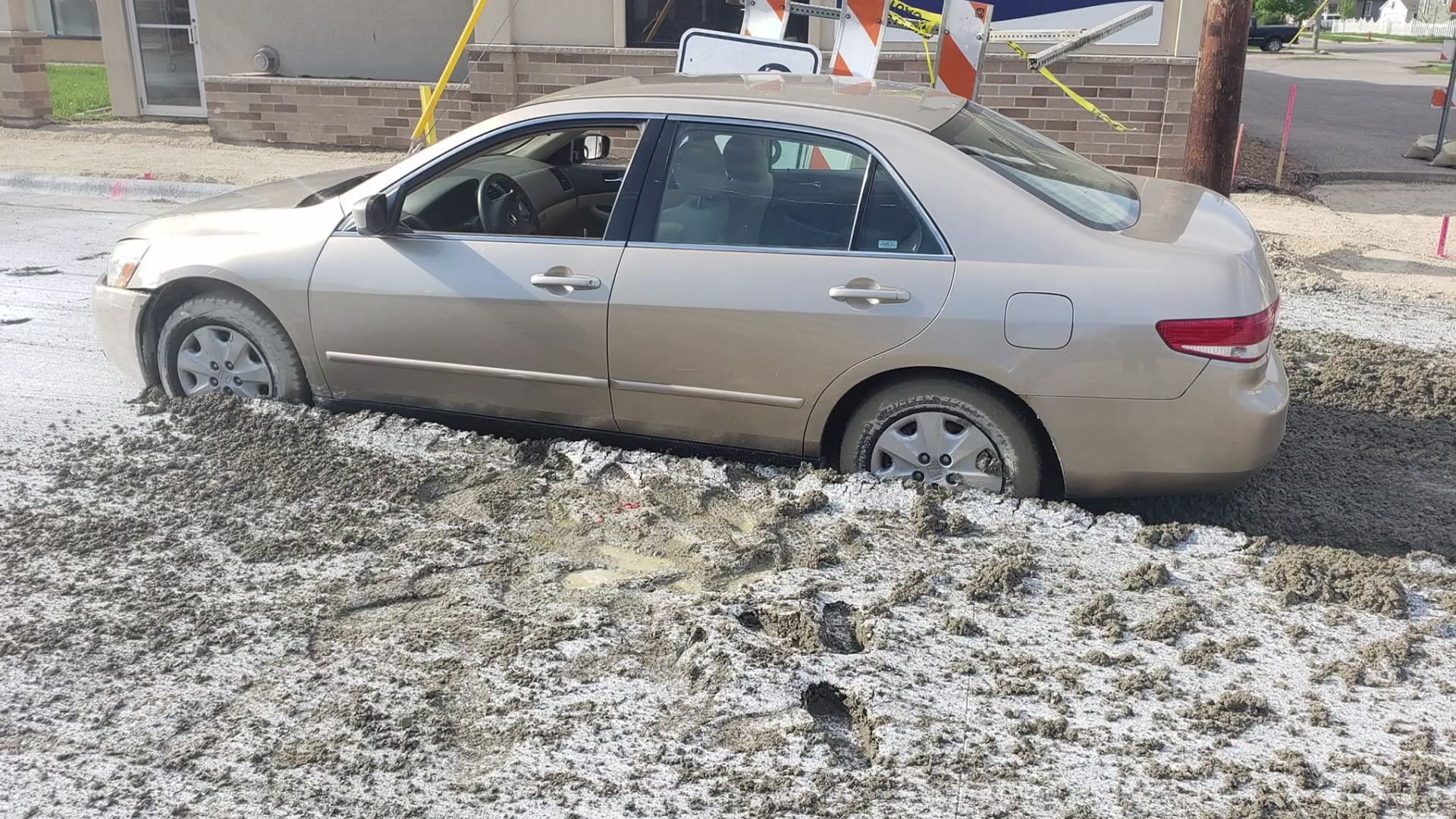 Driver gets stuck in concrete while fleeing police